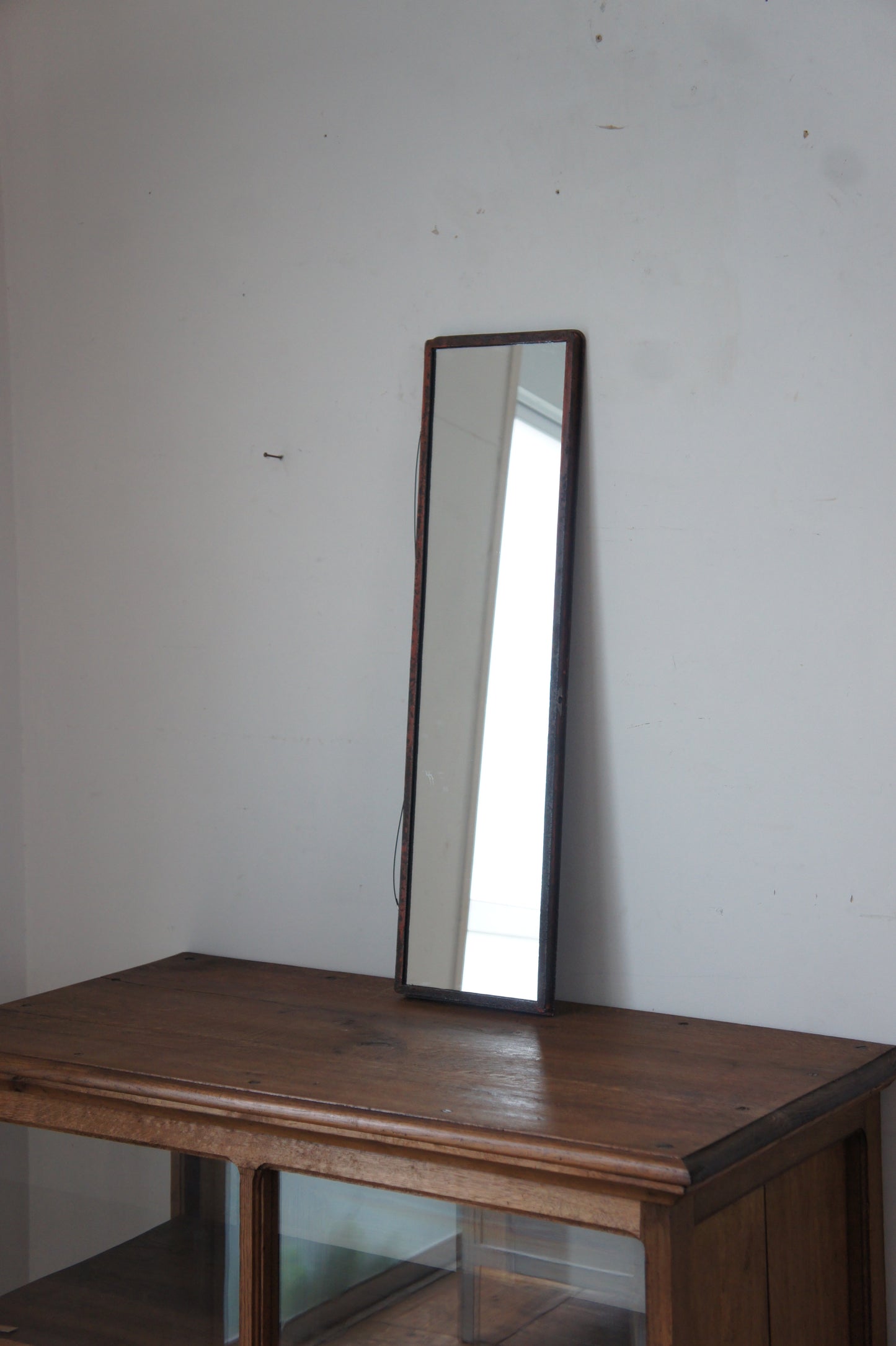 Iron frame mirror