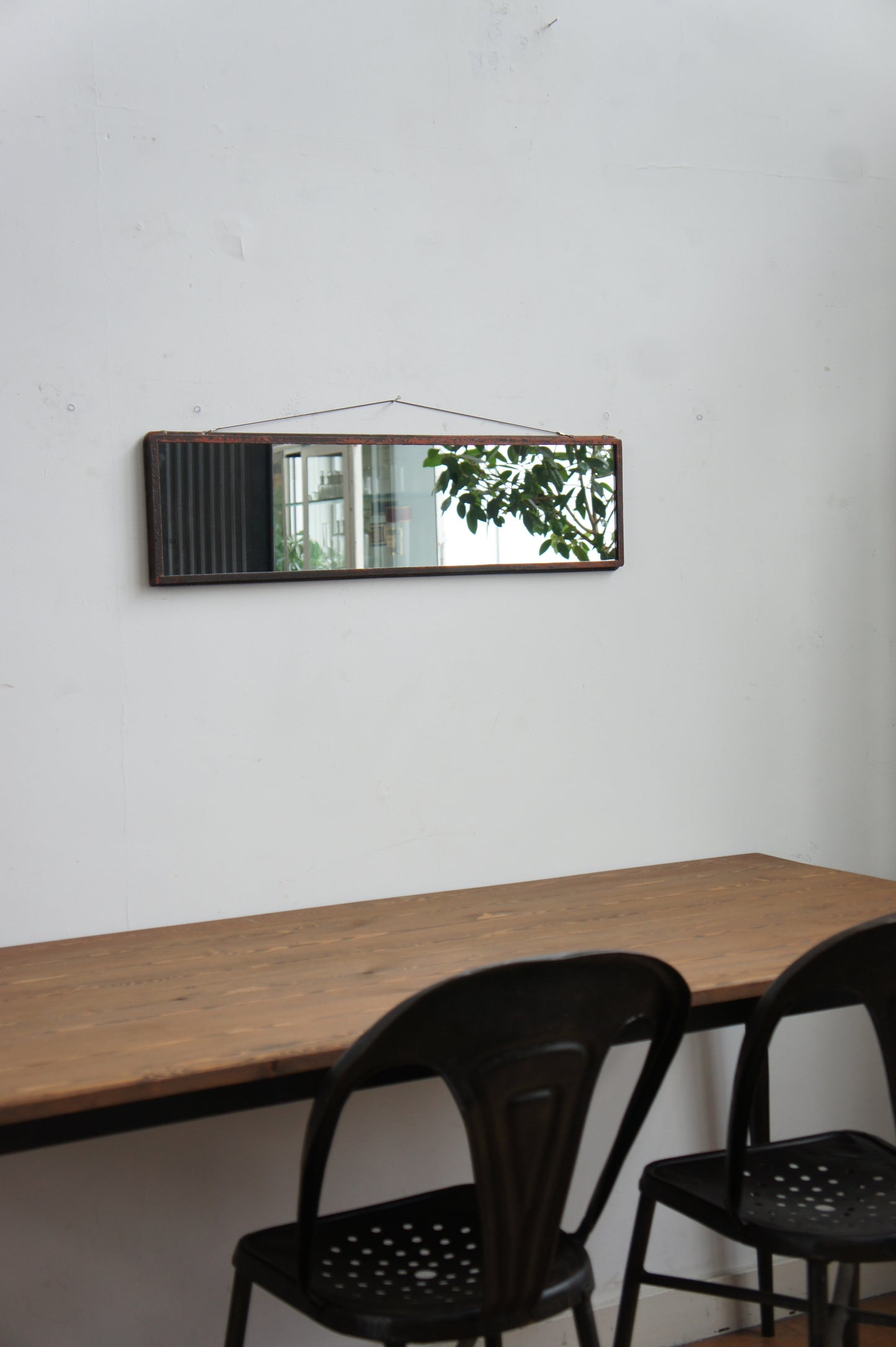 Iron frame mirror