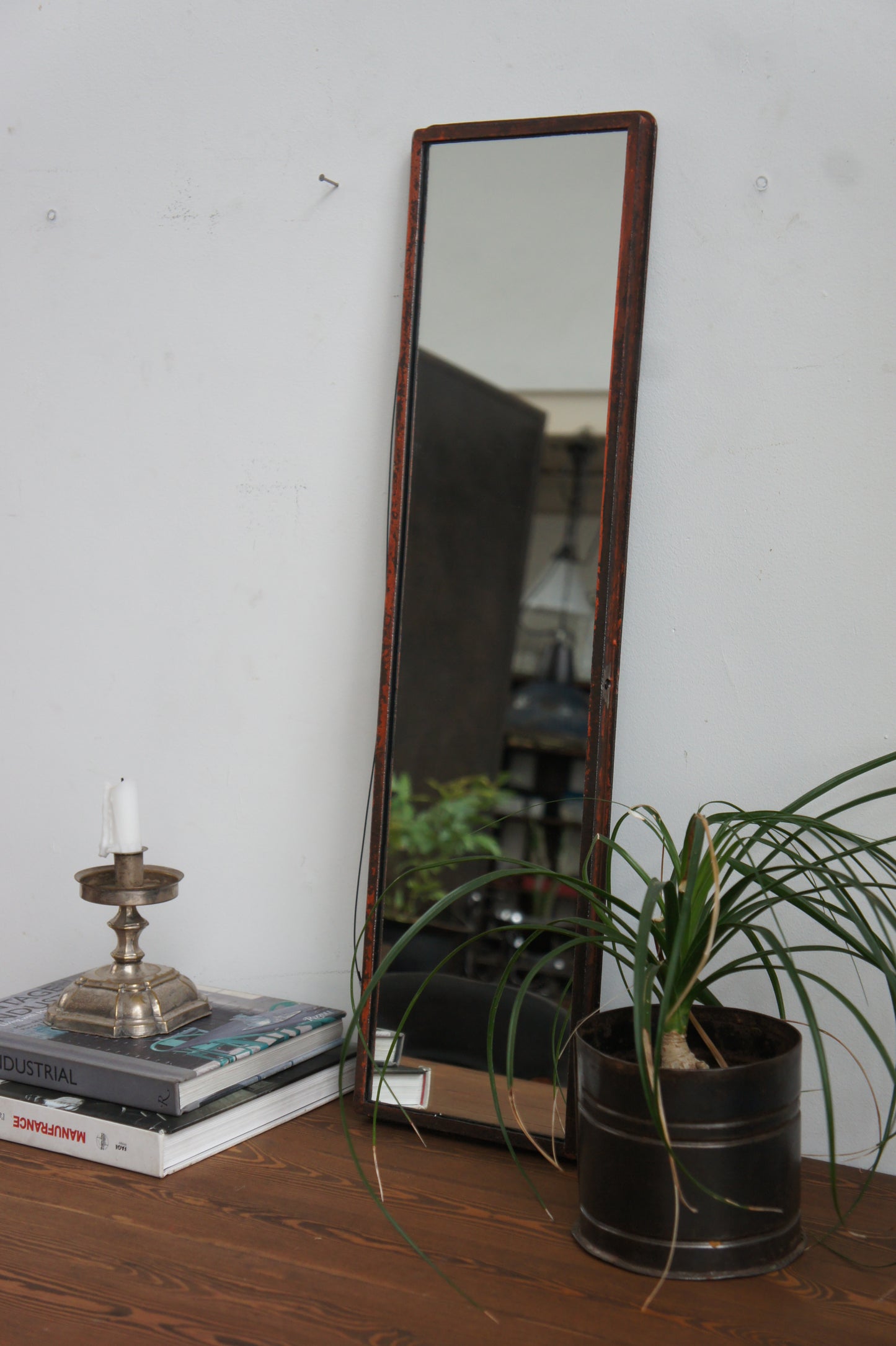 Iron frame mirror