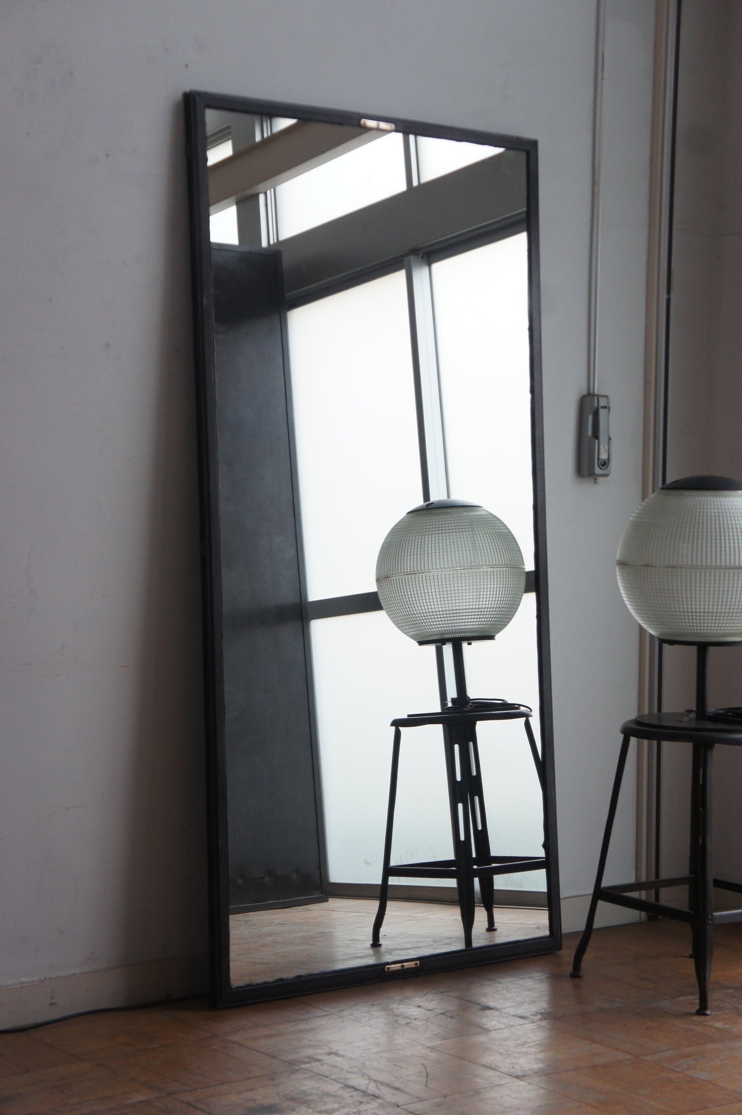 Iron frame mirror