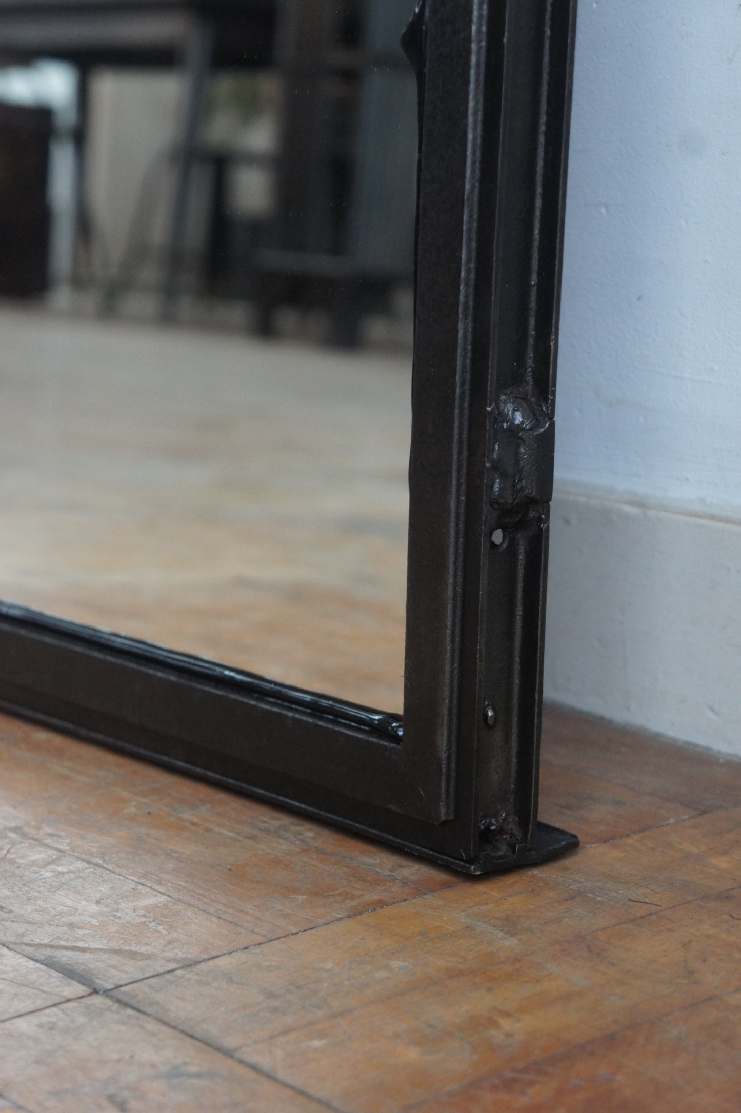 Iron frame mirror