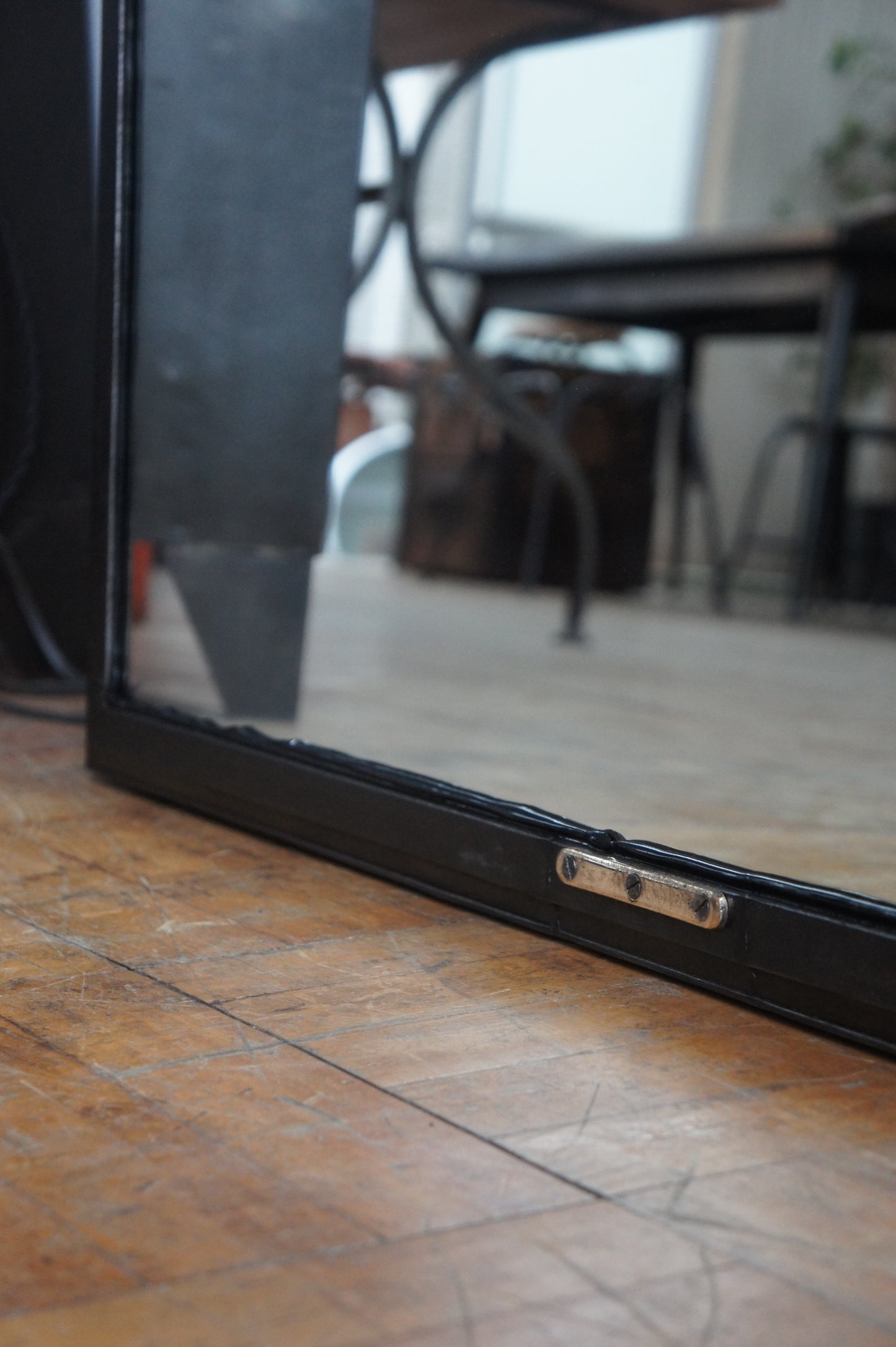 Iron frame mirror