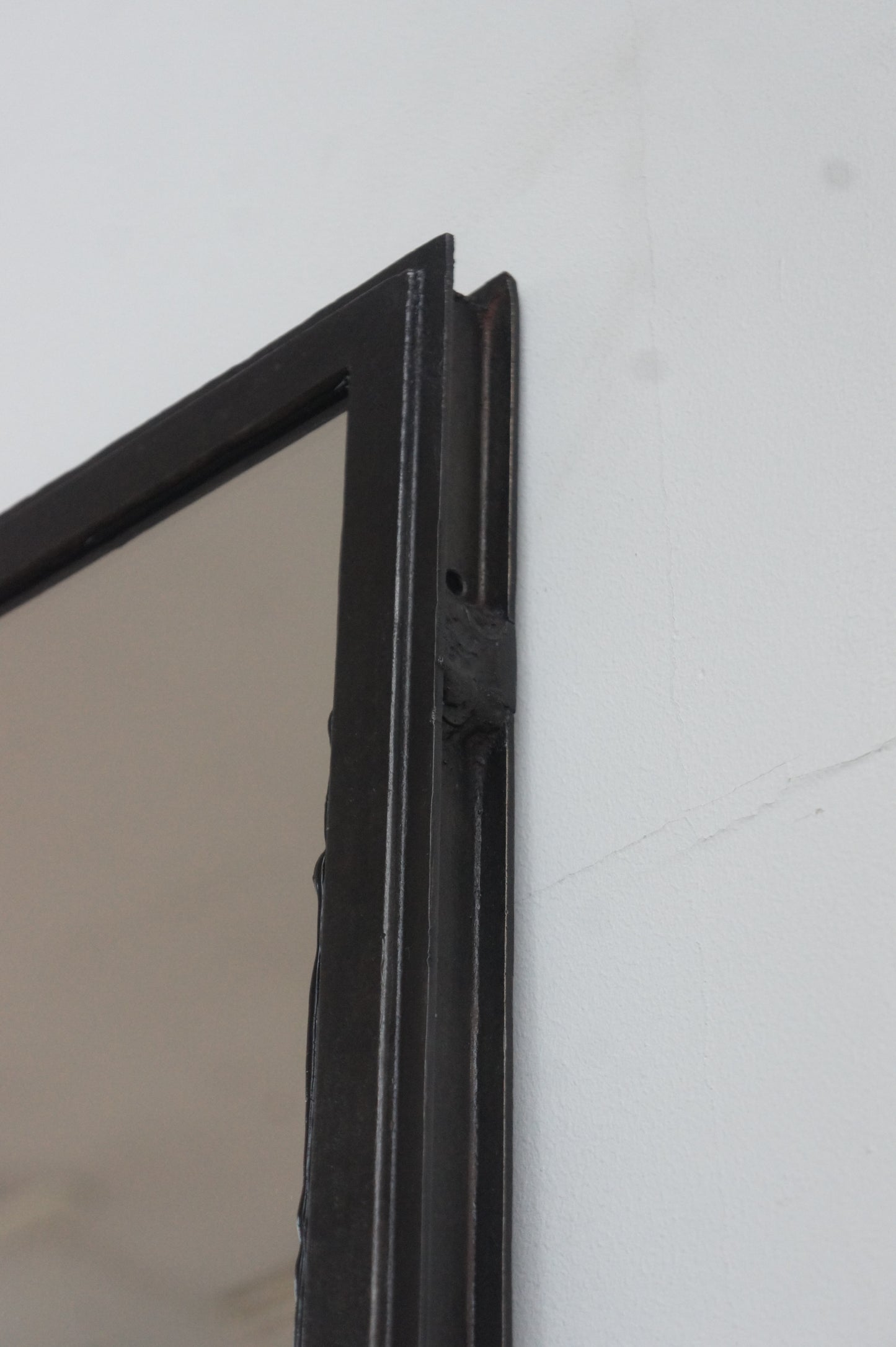 Iron frame mirror