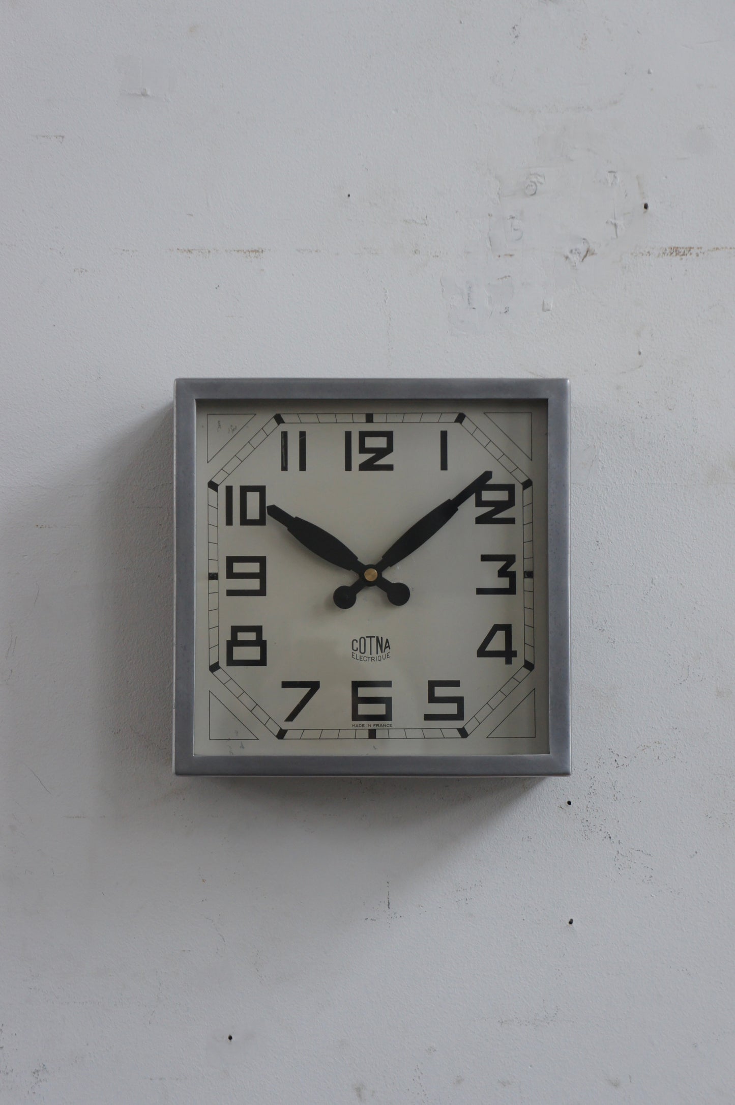 COTNA Wall Clock