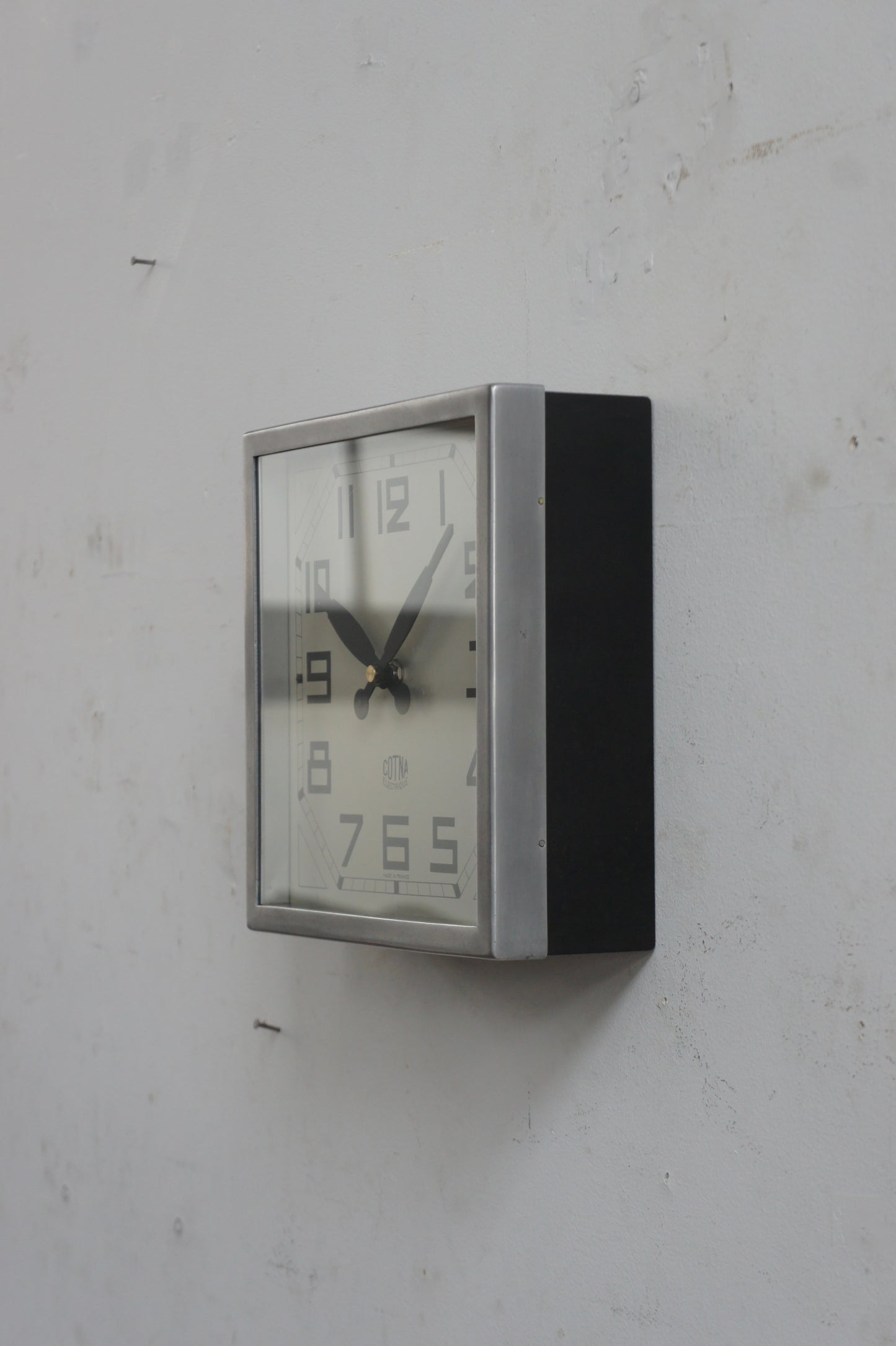 COTNA Wall Clock