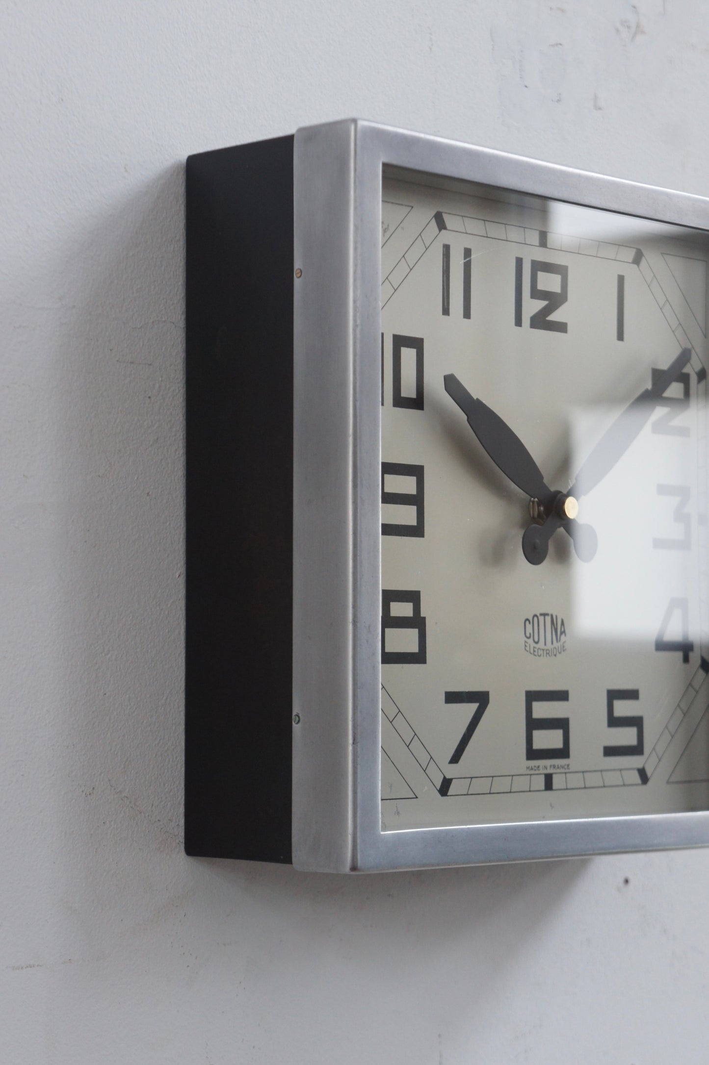 COTNA Wall Clock