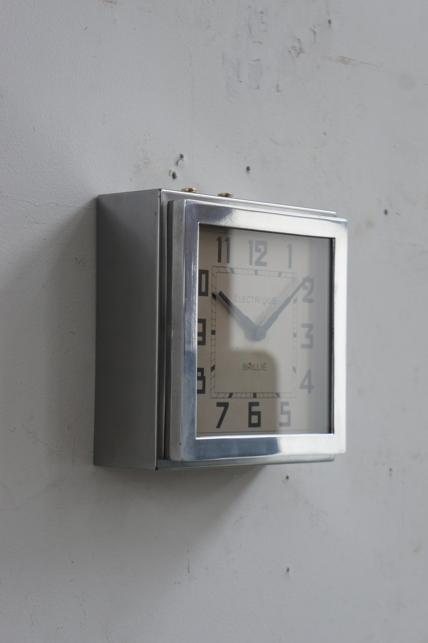BRILLIÉ Wall Clock / carré métal poli