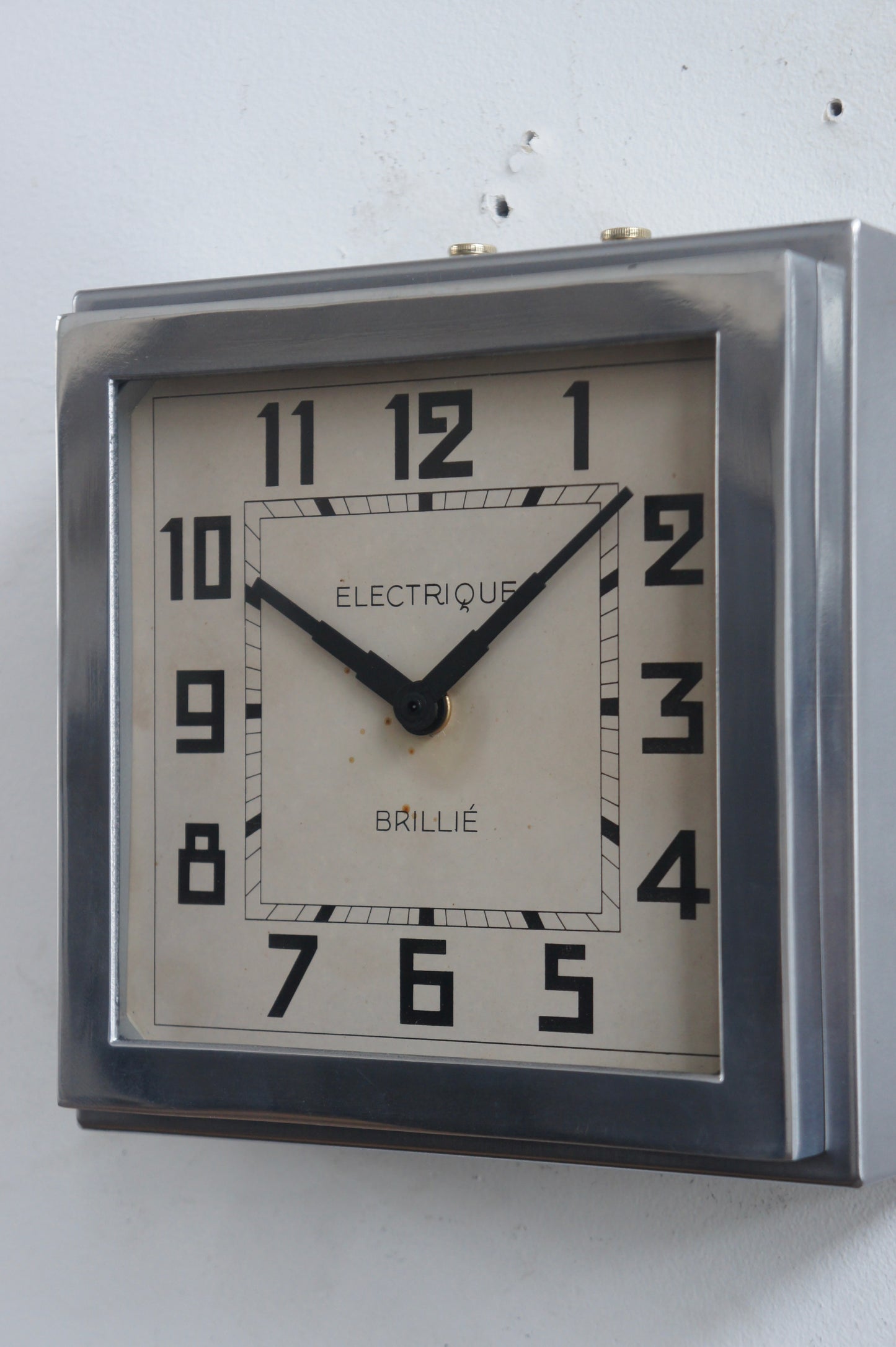 BRILLIÉ Wall Clock / carré métal poli