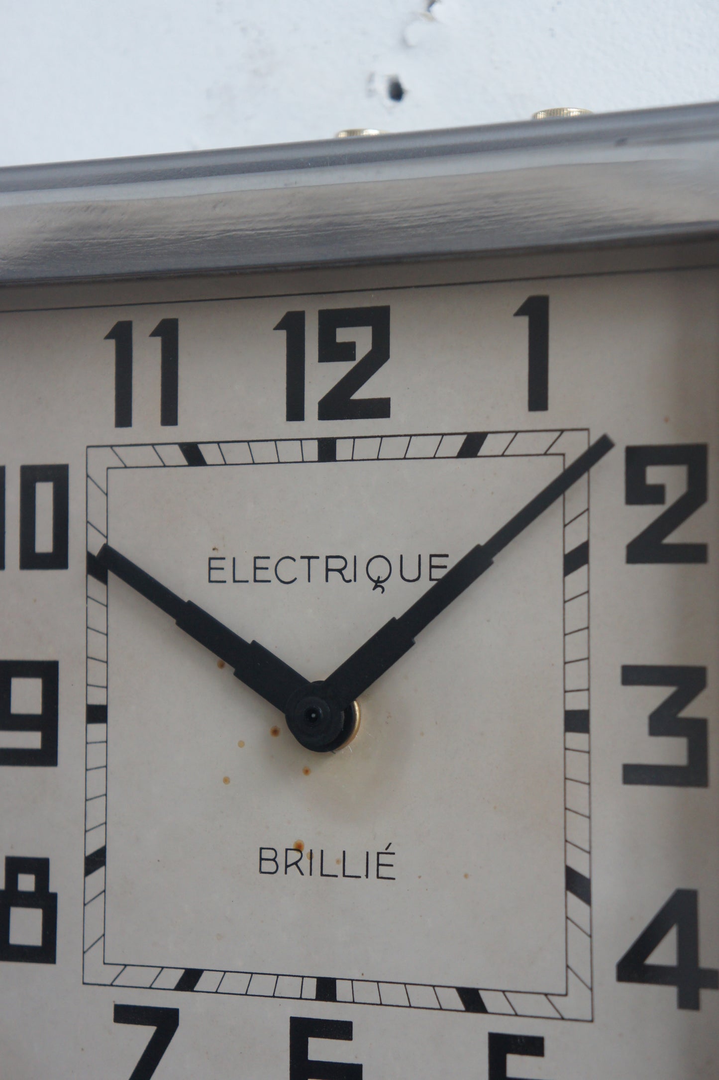 BRILLIÉ Wall Clock / carré métal poli